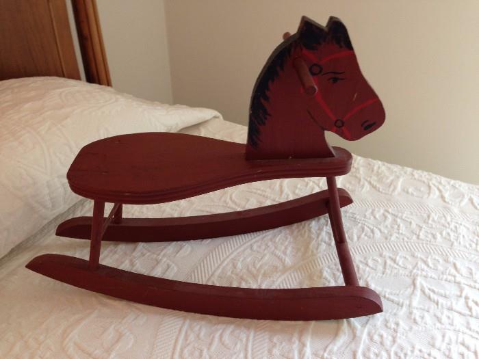 Miniature painted wood rocking horse, small child size
