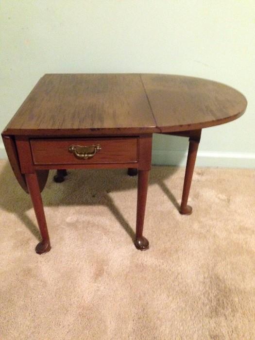 unusual end table with drop leaf to make coffee table