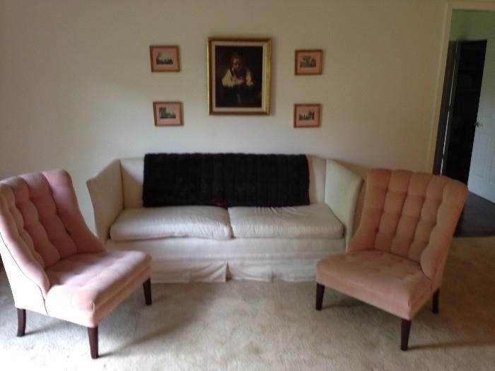 Pink chairs (sold), white sofa, faux mink blanket, Rembrandt print, lots and lots of small framed art prints