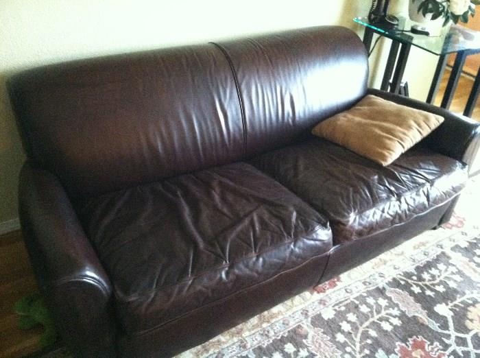 Brown leather hide-a-bed ($100)
