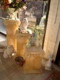 Set of 3 Columns in the Front Garden Room hold a variety of Vintage Porcelain pieces surrounded by planters