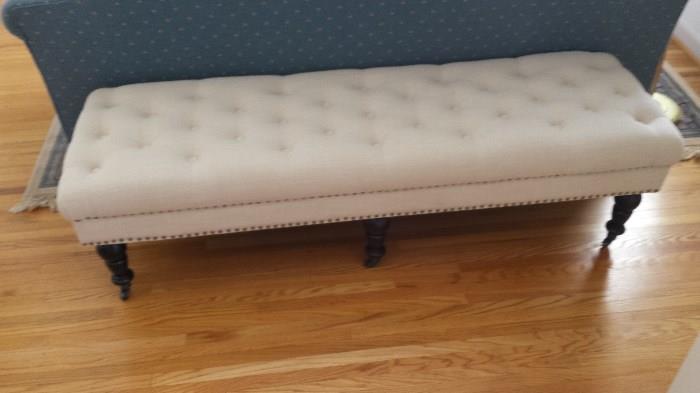 New upholstered bench bought from Saturday Morning.  Beige fabric, new condition.