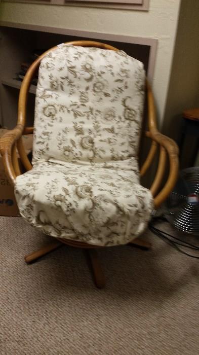 Rattan rocker, fairly old, chair in pretty good condition.  Needs new cushion.