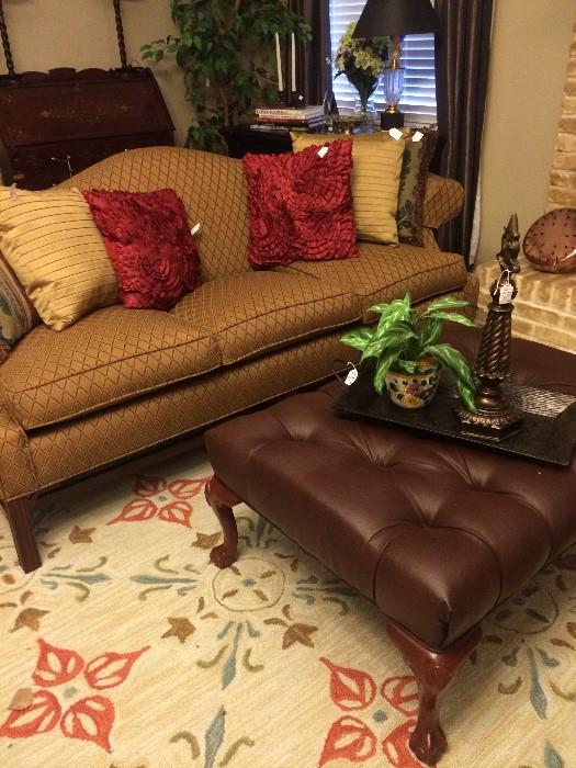         Newly upholstered sofa; tufted ottoman