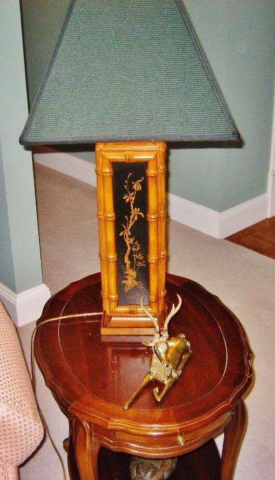 One of a pair of matching Oriental table lamps; occasional table