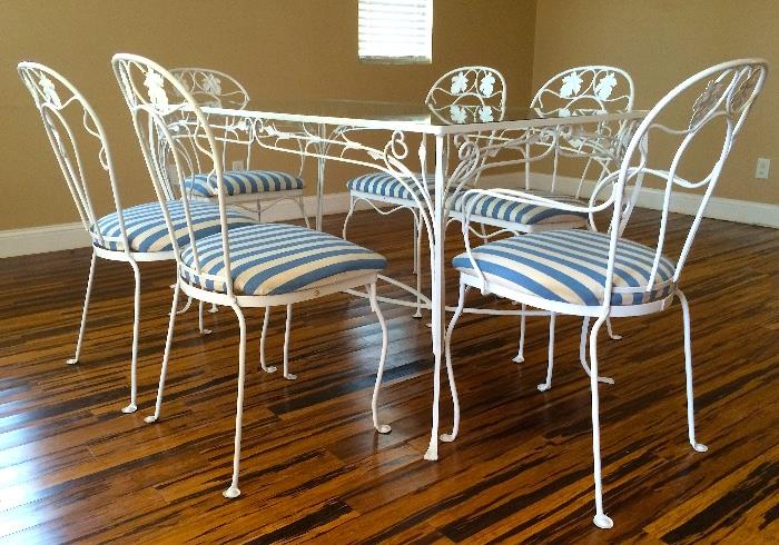 Vintage Salterini Dinning Set with 6 Chairs. New tempered glass top. Mount Vernon Ivy Design. Excellent condition. Patio, Garden, Lanai wrought iron furniture.