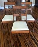 three solid maple chairs