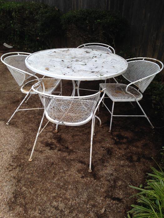 Vintage wrought iron table with 4 chairs