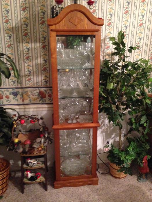 Lighted display cabinet with lots of nice glassware