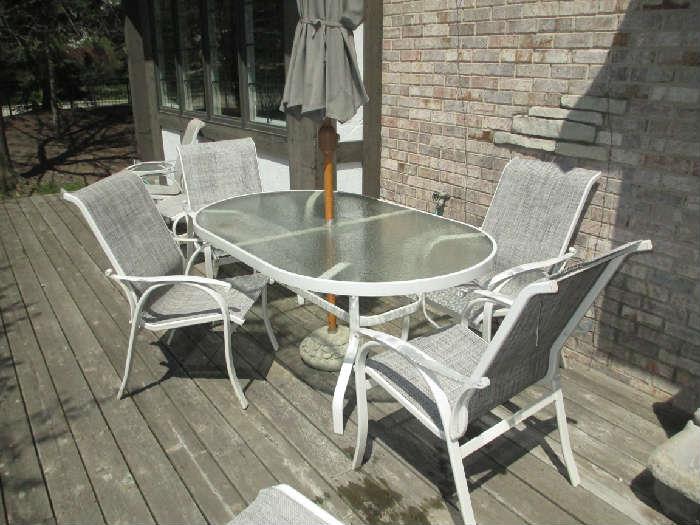 PATIO TABLE AND CHAIRS
W/ UMBRELLA AND STAND
