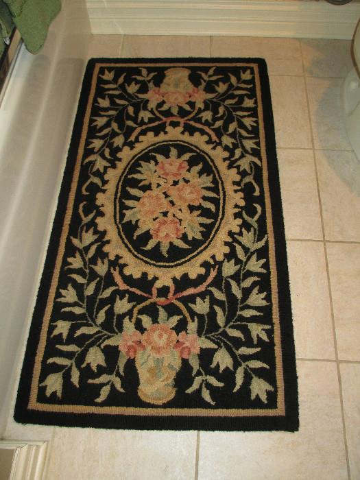 SMALL BLACK FLORAL CHINESE 
NEEDLEPOINT RUG
