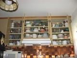 Example of 27 kitchen shelves, cabinets & drawers tightly filled