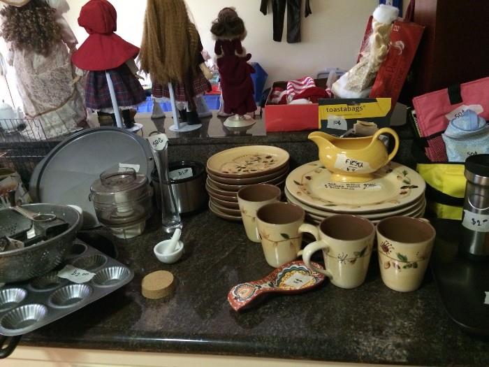 An abundance of cookware and dishes in decent to excellent condition. Pottery Barn galore! Small electric kitchen appliances going for cheap.