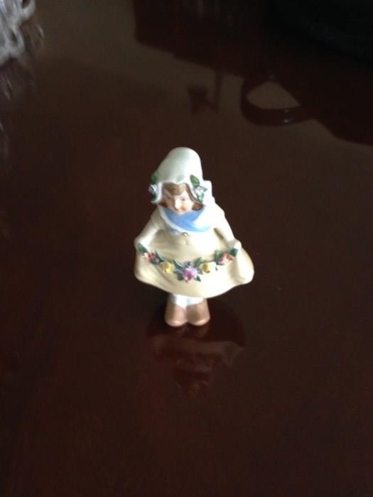 Dutch girl approx. 7-8 inches. Her head and body bobbles