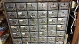 a bank of 42 older Safety Deposit boxes with keys