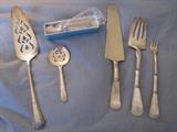 The Sterling serving pieces. There is a set of sterling spoons ( 280 grams - not pictures)