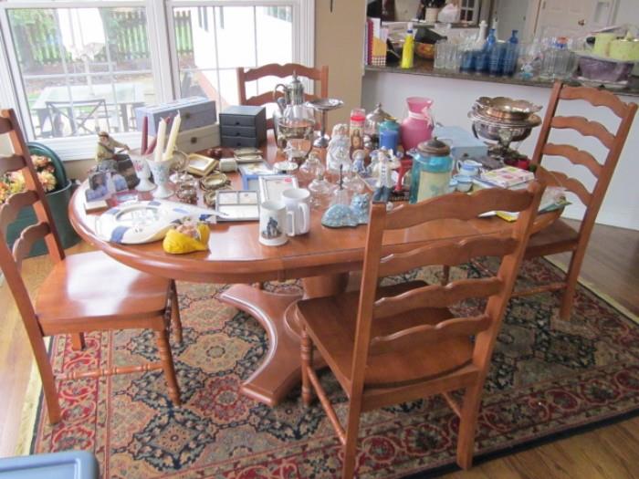 Items on table and rug, not the table & chairs.