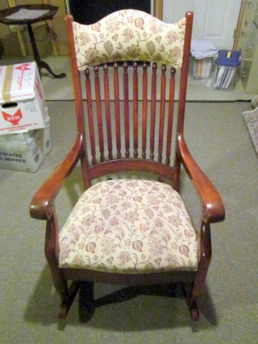 Antique cherry rocking chair.