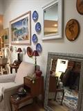 Blue and white plates, Serigraph by Thomas McKnight, small end table, silver framed mirror