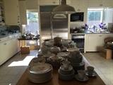 Dishes, silver plate serving pieces, old blue bottles, kitchenware, Butcher Block 3' x 8' dining table