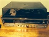 Turntable with built-in cassette player, 8 track & tuner.