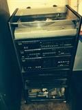Stereo tower with AKAI turntable, cassette player, receiver, tuner, equalizer and cabinet. $150 takes all of this!