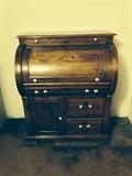 Roll top desk in great condition. Only $150.00