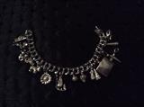 STERLING SILVER CHARM BRACELET W 16 STERLING CHARMS