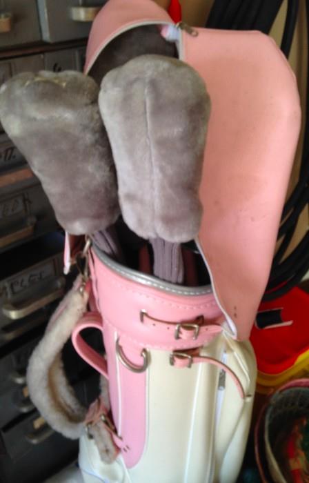 Golf clubs & pink bag