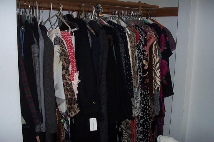 Clothes--from size 8 to 14--many with tags still on.