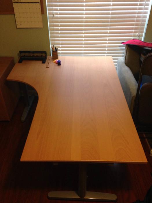 Contemporary office desk with matching file cabinet under desk