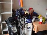 Ladies club set, Jan Stevenson, graphite.  Mens set, Spaulding. Assorted woods and drivers, some senior shaft