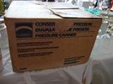 Mirro pressure canner and boxes of canning jars