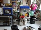 Toaster oven, juice extractor, assorted pots and pans