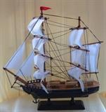 Two masted model ship.