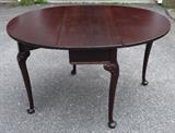 Mahogany gate-leg table.