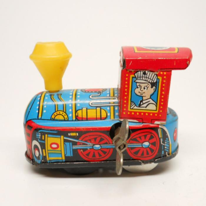Vintage Tin Litho Train. Works Like a Charm! Very Fun!
Condition: Very Good
Shipping: Yes
Size:  2.5"L x 2"