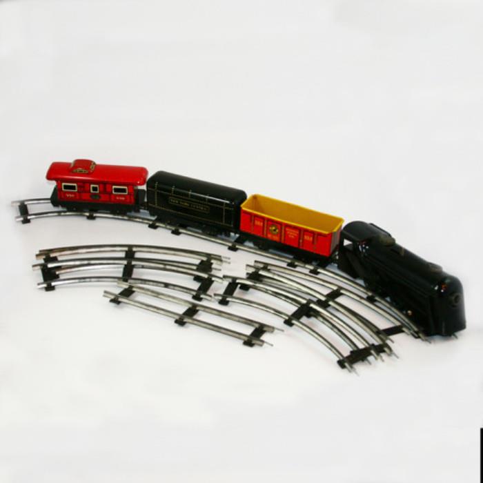 Vintage Tin Litho Train with Full Oval Track. Made in U.S.A. Friction Engine. (8) Curved & (4) Straight Track Pieces.
Condition: Very Good
Shipping: Yes
Size:  Engine 8.5"L. Track Rails 1.5" Wide. 