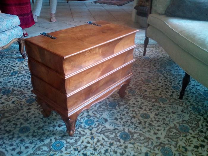 Elegant, Small wooden piece used as a coffee table or end table, opens at the top, and has drawers