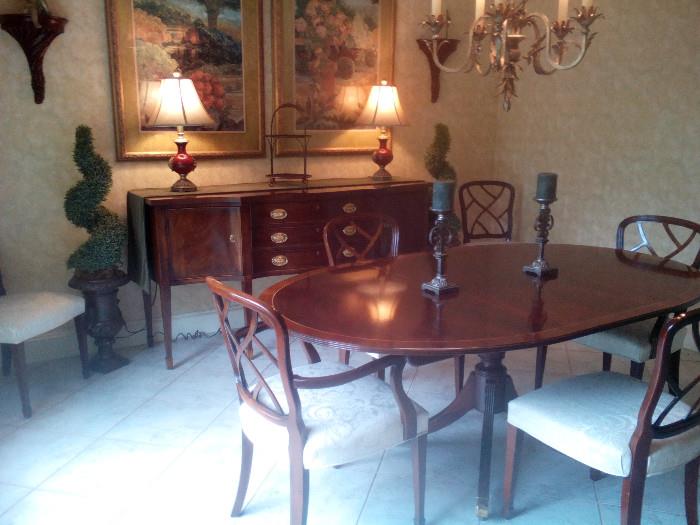 Henredon Buffet, Dining Table by Baker, and 6 Kindel chairs 1800 collection (made in USA).  also for sale the large beautifully framed prints, sconces and topiary pieces.  
