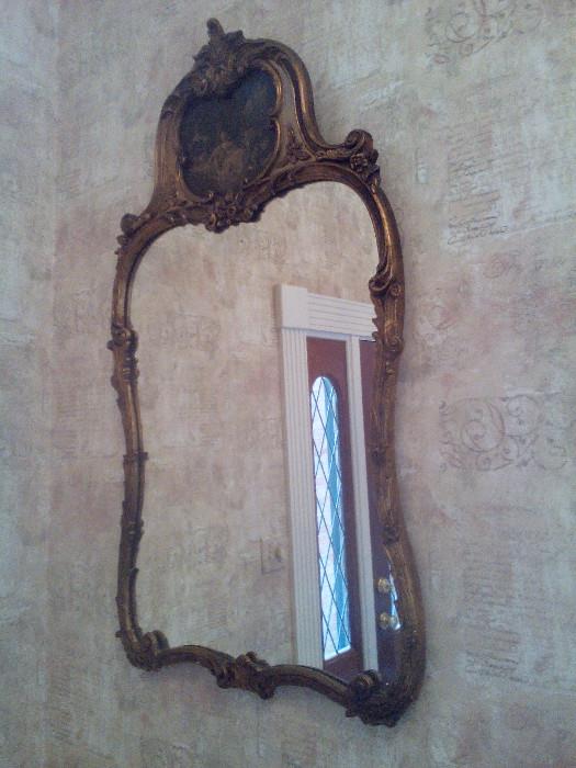 Large nicely framed mirror - This one is in the entry