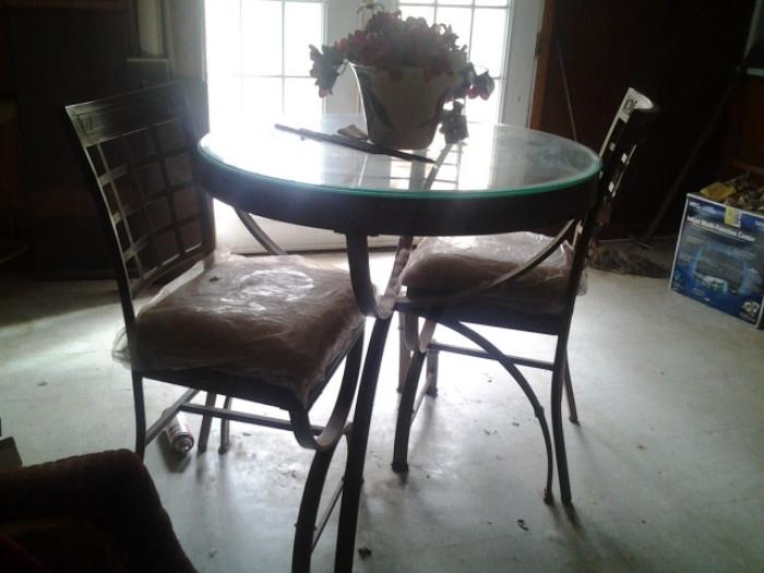 Tall table and 2 chairs and matching pieces