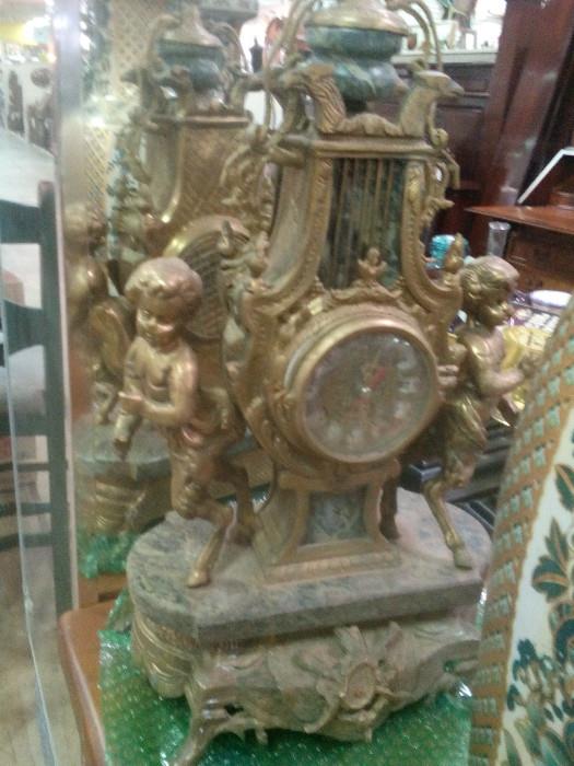 Brass and marble clock -  reproduction - and the matching pair of candellabra