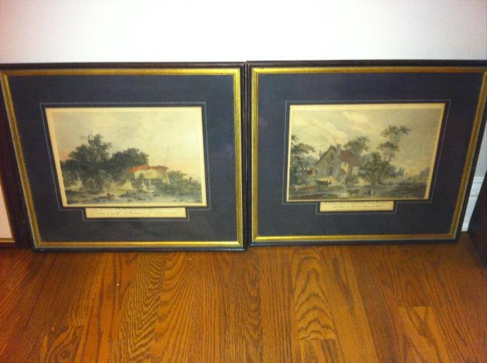 Framed Currier & Ives prints.
