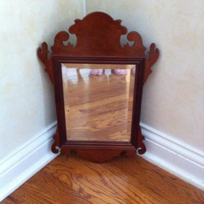 Small beveled mirror in antique-style frame by Bombay company.