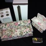 Assorted wooden and upholstered dollhouse furniture.