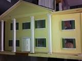 Another wooden dollhouse.