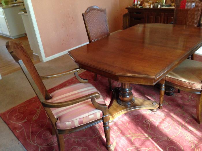 Three-piece dining room set - table has leaves and six chairs