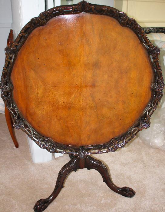 20th c. mahogany tilt-top table with carved pierced gallery