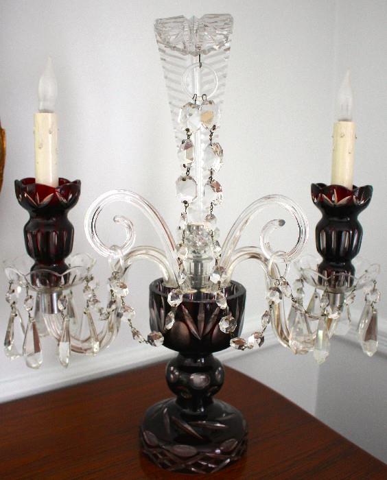 pair of lighted electric ruby cut-to-clear candelabras